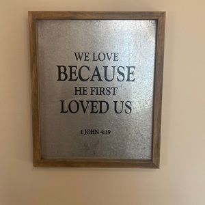 We love because he first loved us wall sign